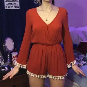 RED / ORANGE ROMPER with WHITE POMPOMS